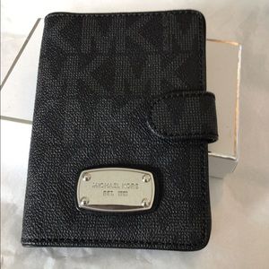 Michael Kors passport wallet